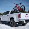 2021 GMC Canyon AT4 in the snow, hauling a bike