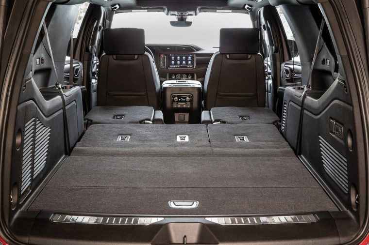 The 2021 GMC Yukon interior with the back rows folded down