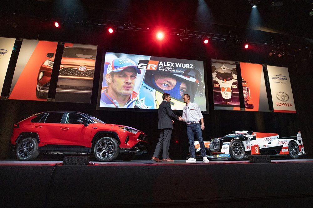 Larry Hutchinston and Alex Wurz shake hands at 2020 Canadian International Auto Show