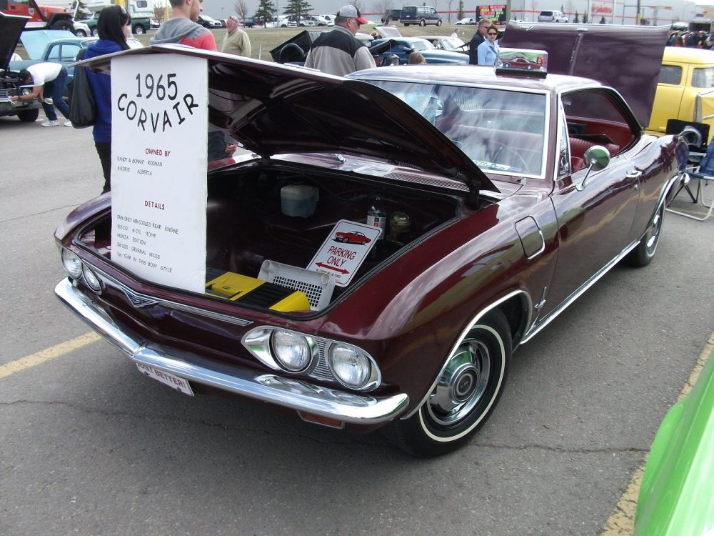 A dark red 1965 Chevrolet Corvair