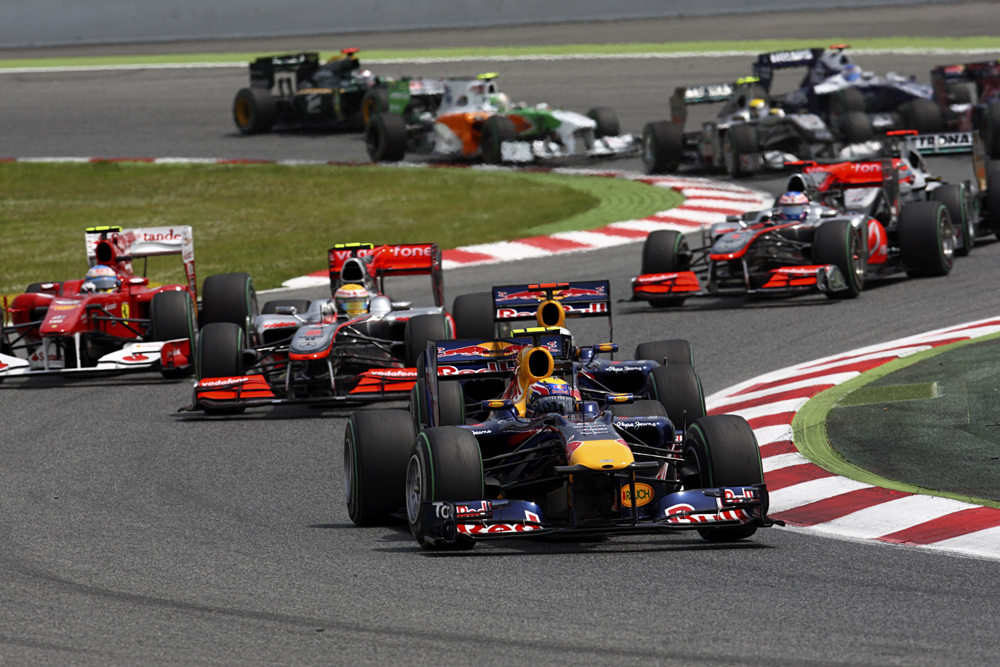 Fernando Alonso during a filming day 2010 print by Motorsport Images