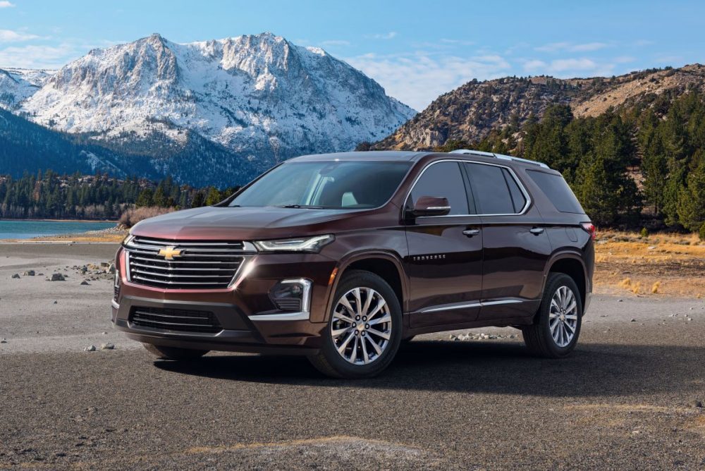 The 2021 Chevrolet Traverse Premier parked with a mountain in the background