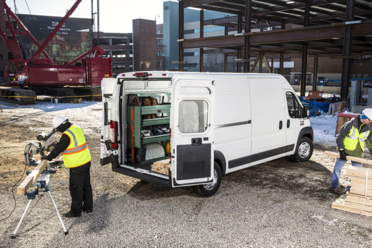 The 2021 Ram ProMaster with its backdoors open on a construction site 