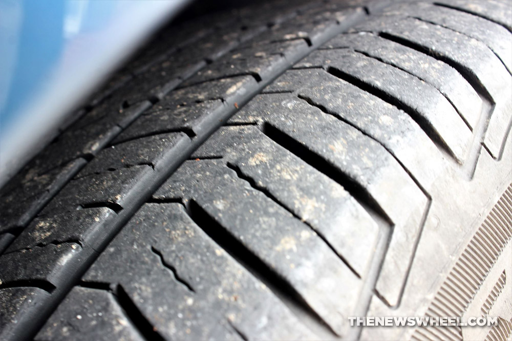 Large wheel on a car with deep tire tread