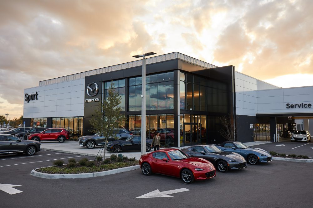 Exterior view of a Mazda Dealership at Sunrise