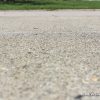 driveway pavement concrete surface cracks stone
