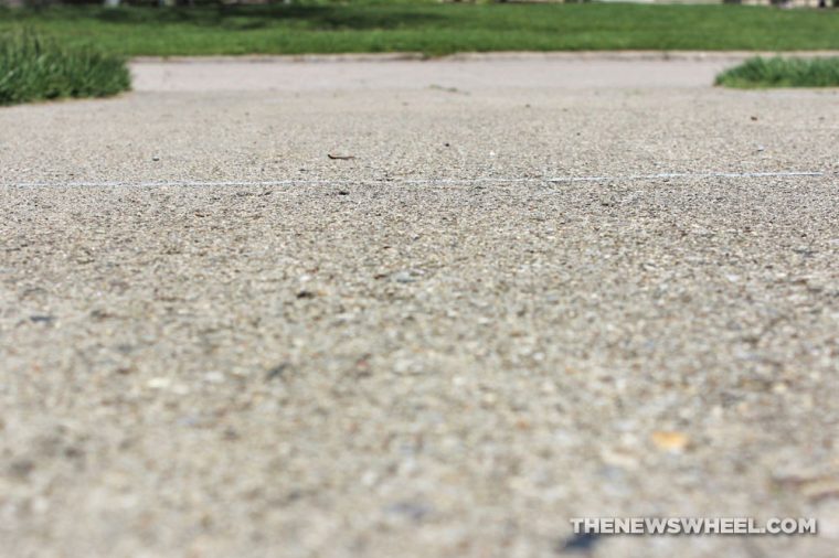 surface-level shot of a concrete driveway