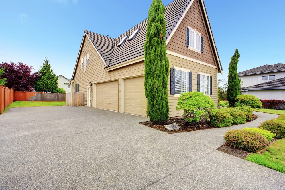 home driveway garage concrete parking house pavement