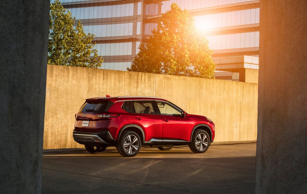 2021 Nissan Rogue in front of a fence