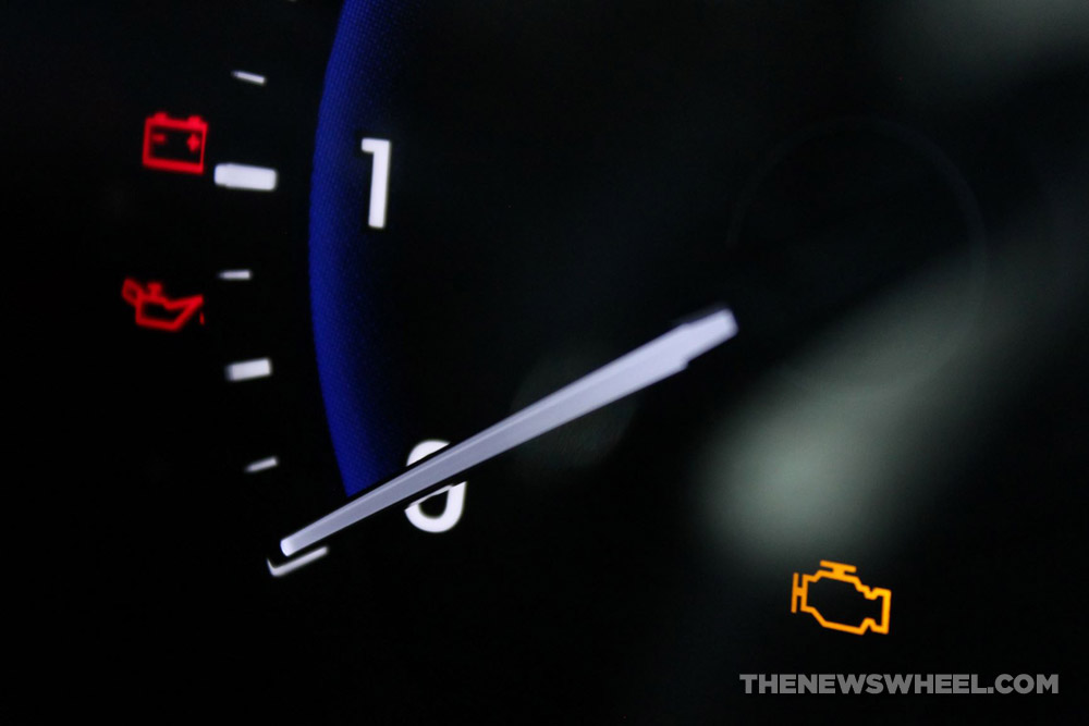 check engine warning light illuminated on dashboard