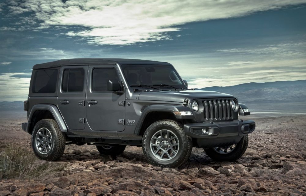 The 2021 Jeep Wrangler 80th Anniversary Edition parked on rocks