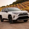 2021 Toyota RAV4 XSE Hybrid Blizzard Pearl in a field