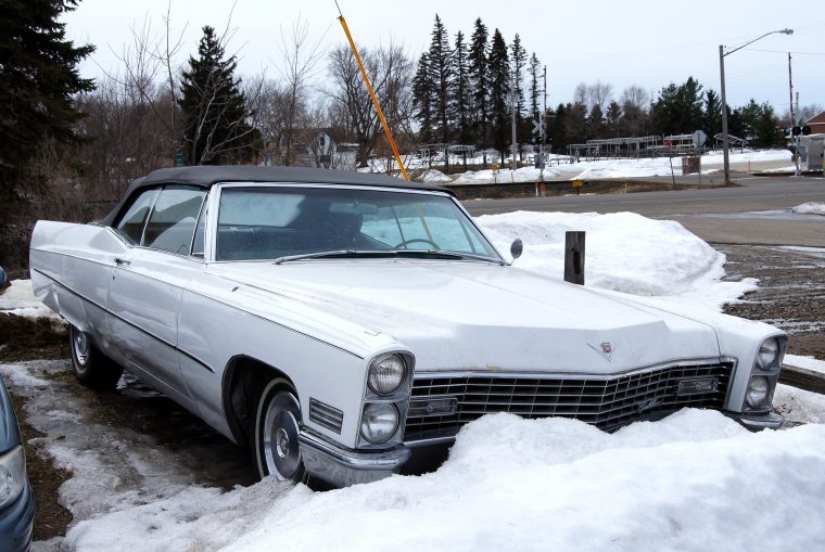 67 Cadillac de Ville convertible in snow