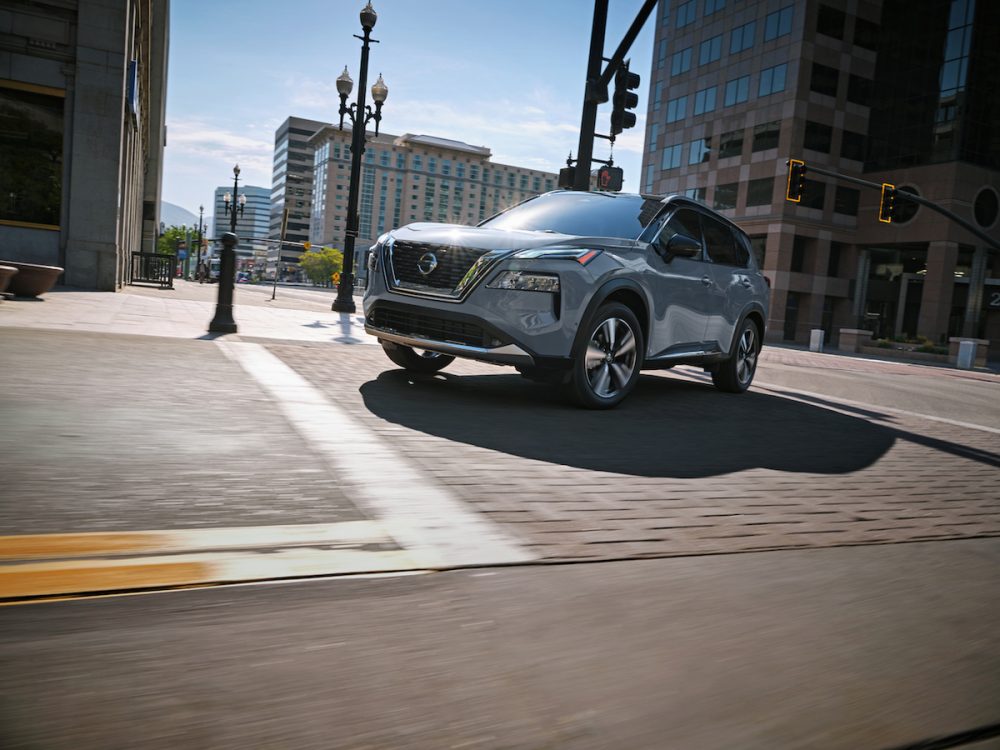 2021 Nissan Rogue driving on city streets