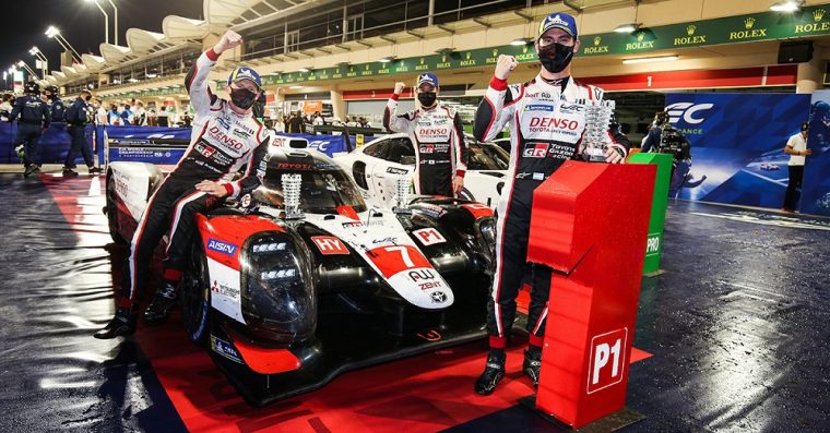 Mike Conway, Kamui Kobayashi and José María López celebrate winning the last championship of the LMP1 era