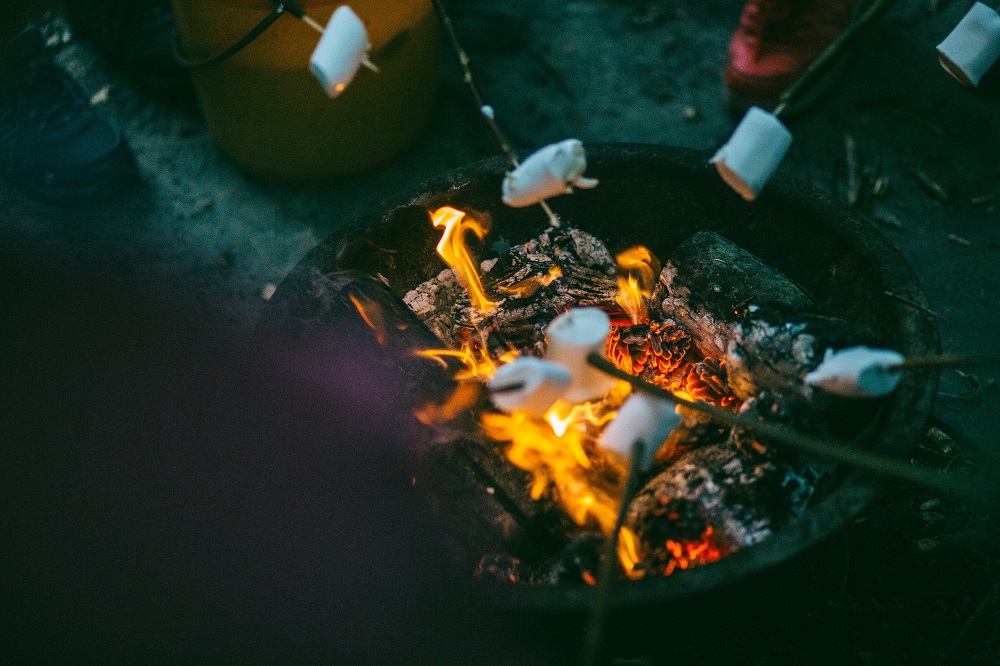 Essential RV accessories - marshmallows over a campfire