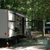 Travel Trailer in a woody campground