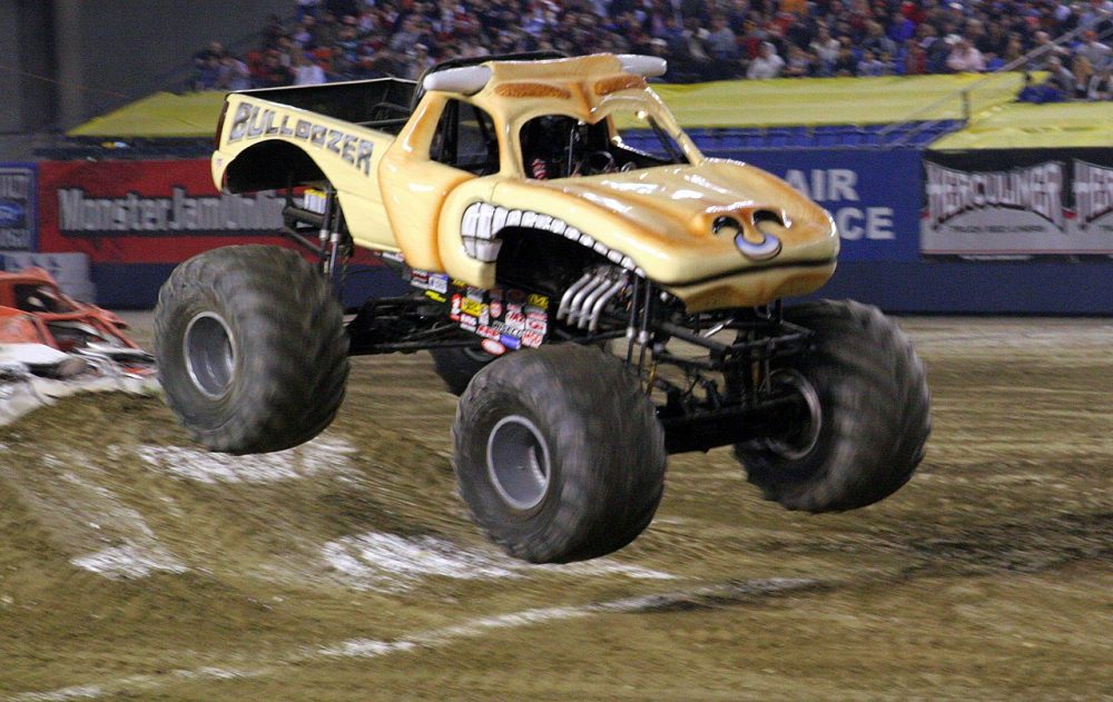 A monster truck doing a sick stunt