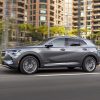 2021 Buick Envision Avenir driving down city street