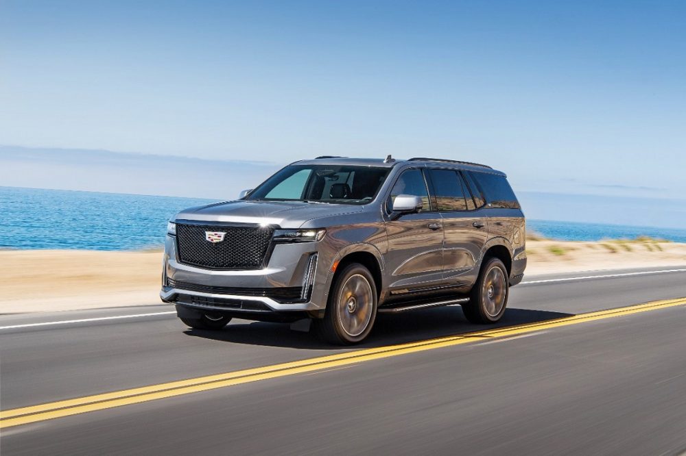 2021 Cadillac Escalade Sport on highway by beach and ocean or lake