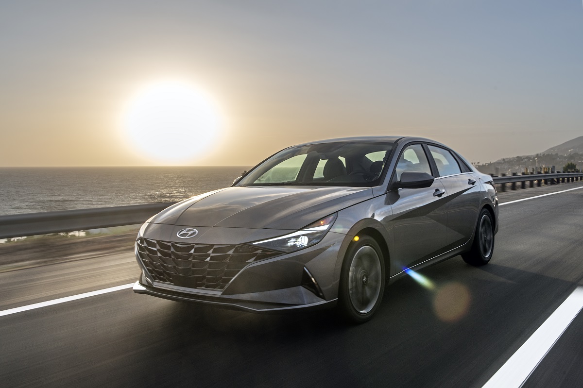 Front side of 2021 Hyundai Elantra Hybrid driving down road