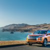 The 2021 Outlander Sport driving by the ocean