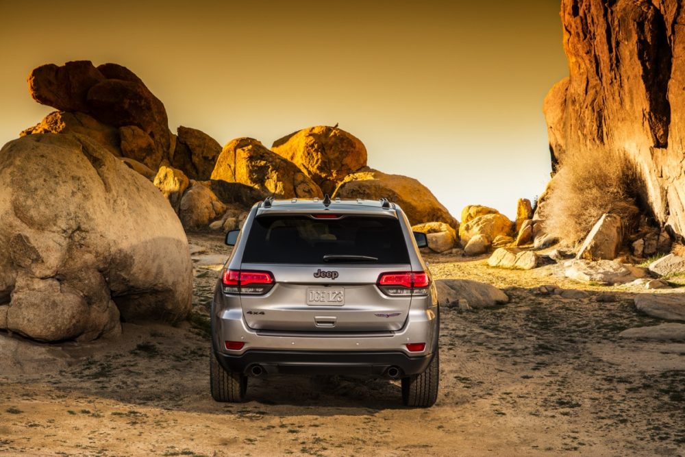 The rear of the 2021 Jeep Grand Cherokee Trailhawk in a desert