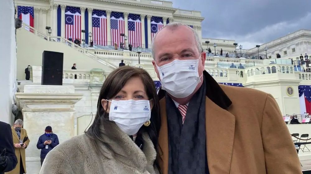 A couple wearing Ford-made face masks during the inauguration of President Joe Biden and Vice President Kamala Harris