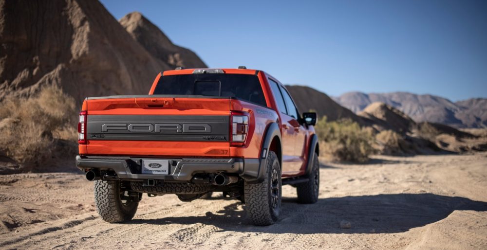 2021 Ford F-150 Raptor driving off-road in the desert