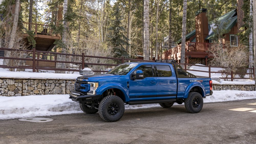 2021 Ford Shelby F-250 Super Baja in front of a cozy cottage