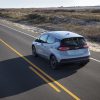 Rear overhead view of 2022 Chevrolet Bolt EV driving down road