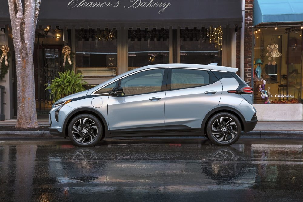 Side view of 2022 Chevrolet Bolt parked on street