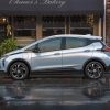 Side view of 2022 Chevrolet Bolt parked on street