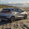 Rear side view of 2022 Chevrolet Bolt EUV on beach