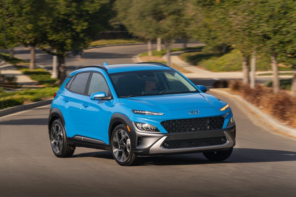 Front side view of 2022 Hyundai Kona making a turn