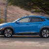 Side view of 2022 Hyundai Kona driving down road