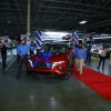 Hyundai Motor Manufacturing Alabama employees celebrate next to the 2022 Tucson