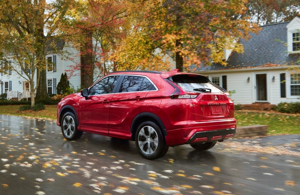 The 2022 Eclipse Cross driving by houses
