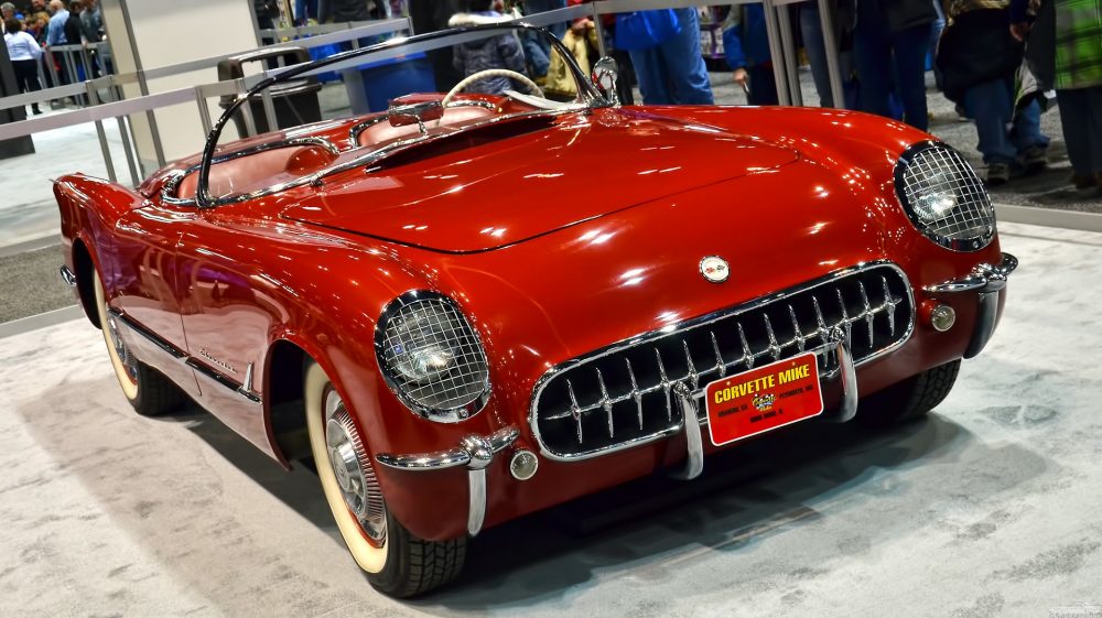 A bright red 1954 Chevrolet Corvette.