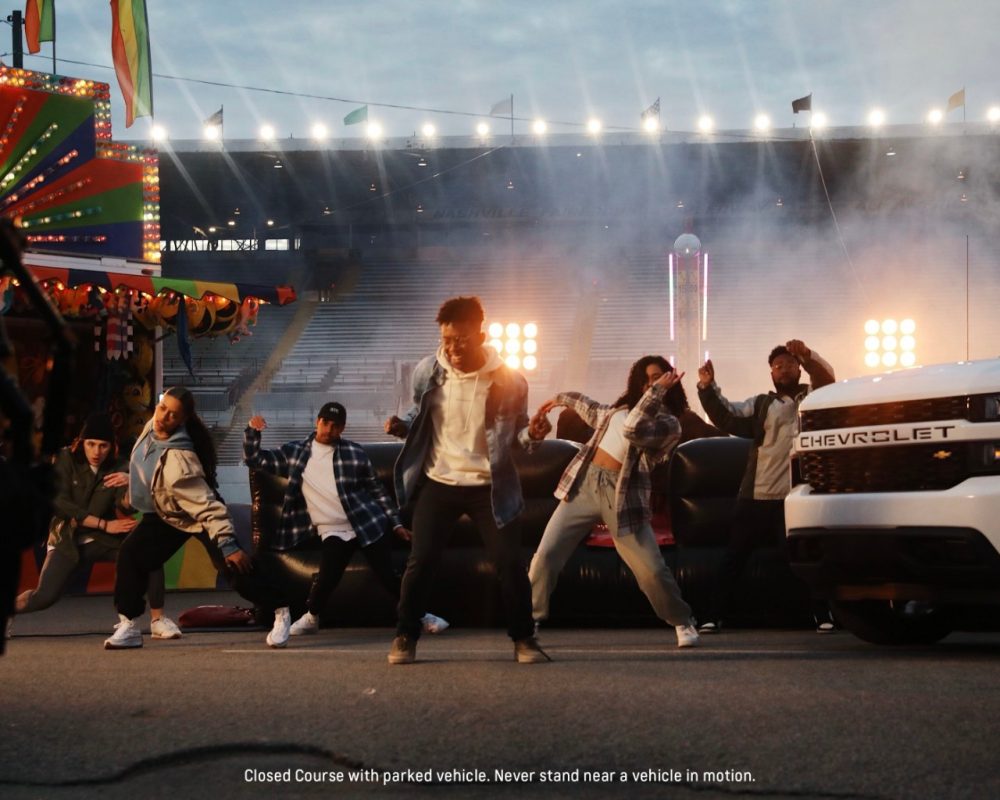 BRELAND and dancers performing in front of Chevrolet Silverado trucks in the rebooted “My Truck” music video