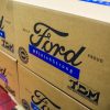 A shipment of Ford-made masks branded with the company's #FinishStrong slogan