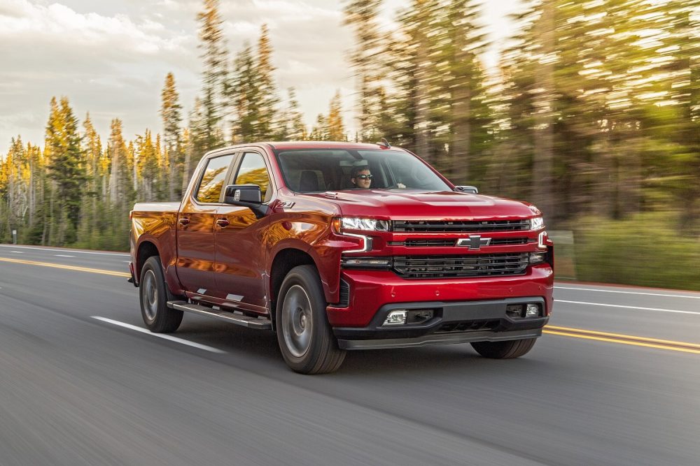 Diesel Chevrolet Silverado driving down road