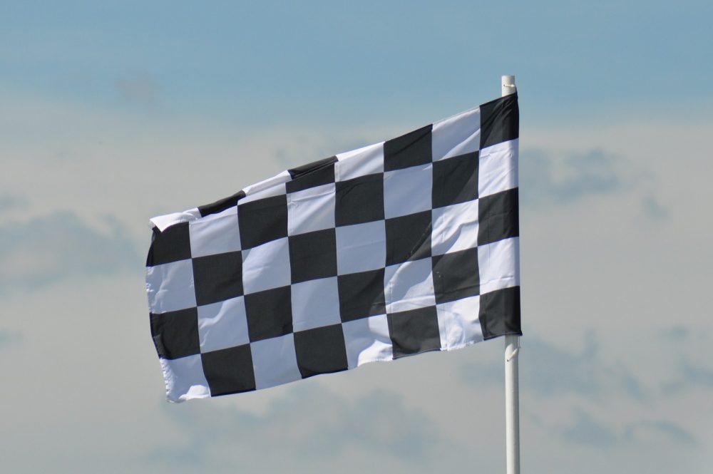 A Checkered flag billowing in the wind