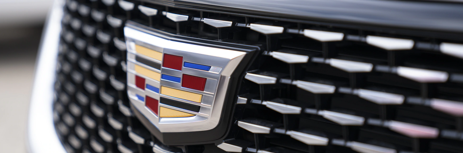 Cadillac badge on the grille of the 2021 Cadillac XT6