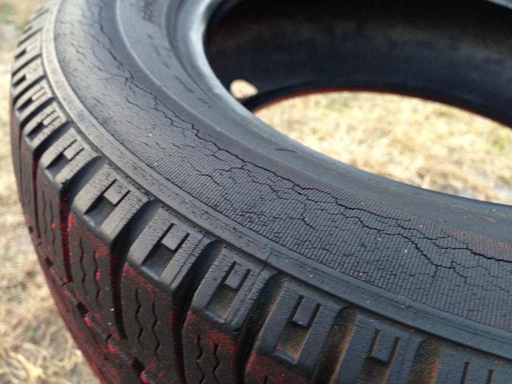 An old tire laying in the dirt