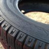 An old tire laying in the dirt