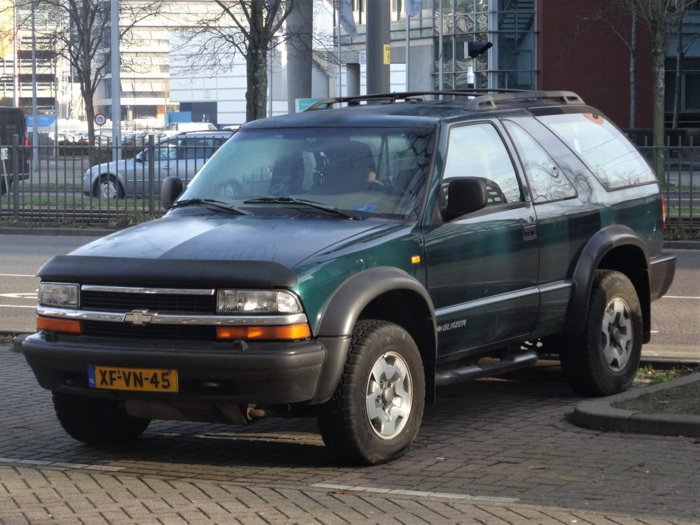 A blue/green 1998 Chevrolet Blazer