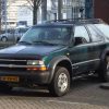 A blue/green 1998 Chevrolet Blazer