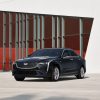 2021 Cadillac CT4 in front of a red and white geometric backdrop