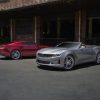 2021 Chevrolet Camaro LS and LT parked by a brick building